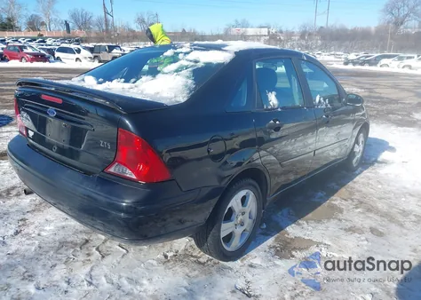 2004 Ford Focus Zts z USA, uszkodzony, nr VIN 1FAFP38Z34W116246